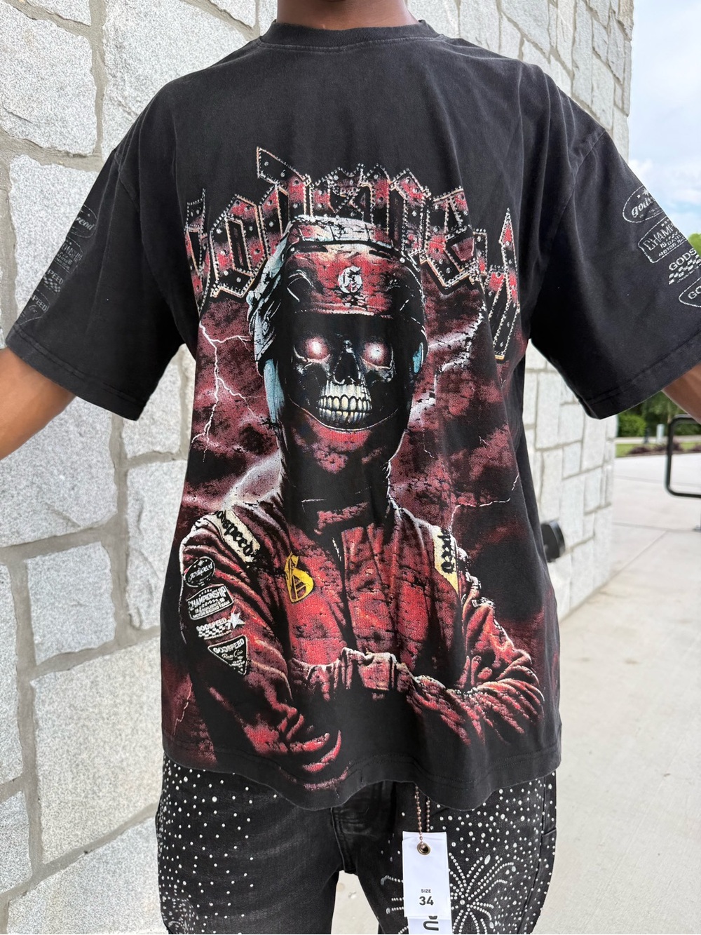 Black Short-Sleeve Graphic Tee with Red Skull Racer Motif